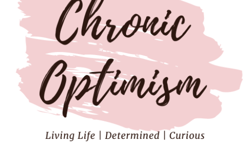 Site logo. Chronic Optimism in a cursive font against a light pink background. Under the title, it says Living Life | Determined | Curious